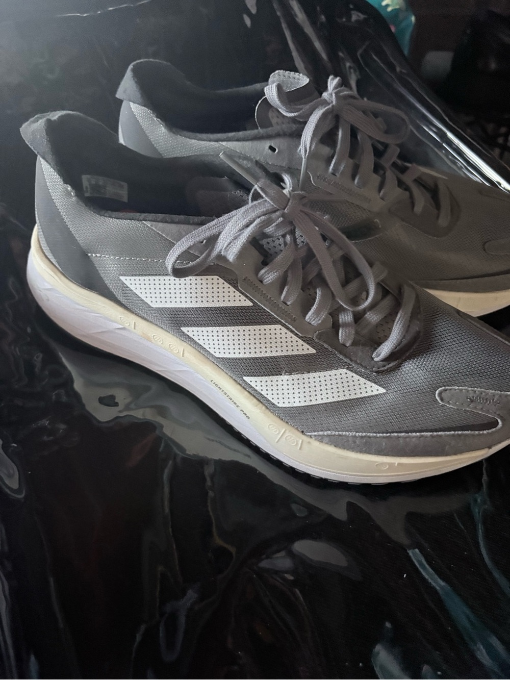 adidas Men’s Gray Athletic Shoes with White Stripes